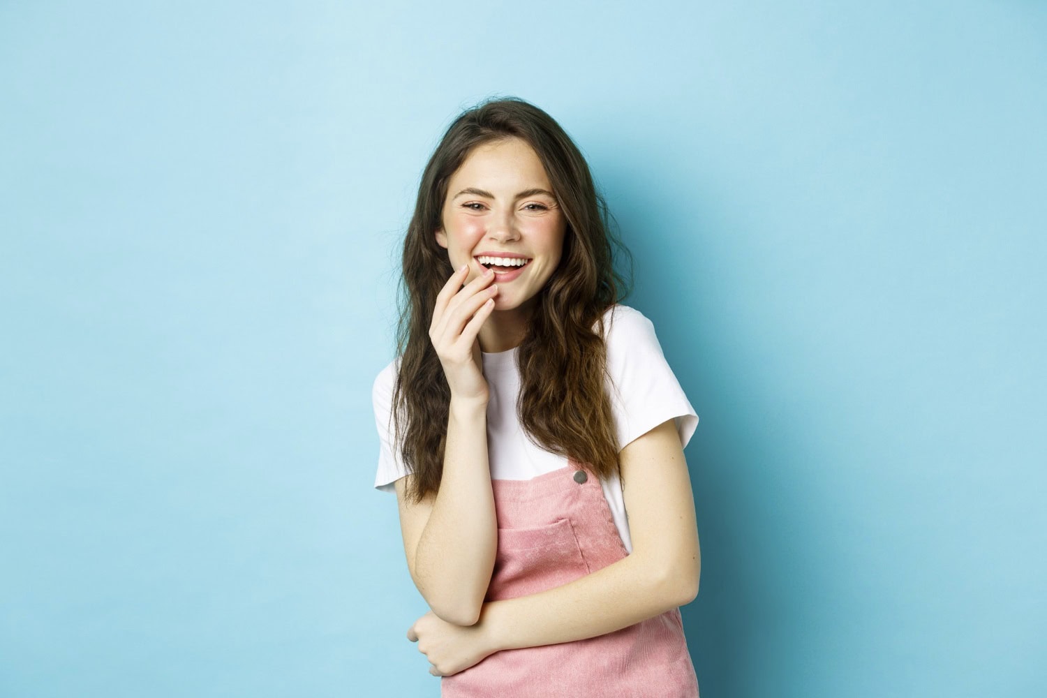 Smiling woman feeling wellness with bioenergetic hair-testing results